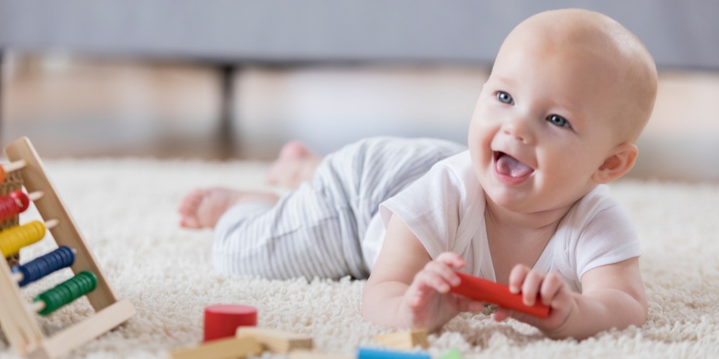 Infant smiling at daycare